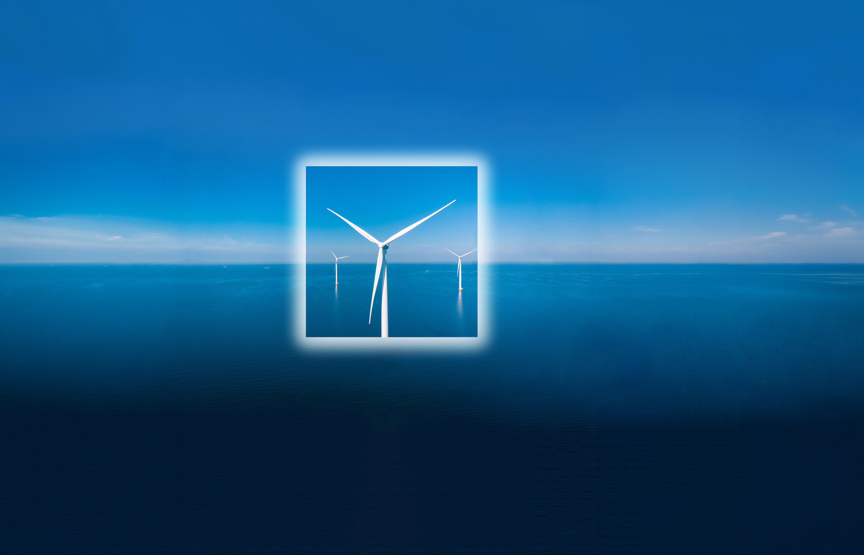 A white wind turbine sits in the middle of an ocean framed by a white square.