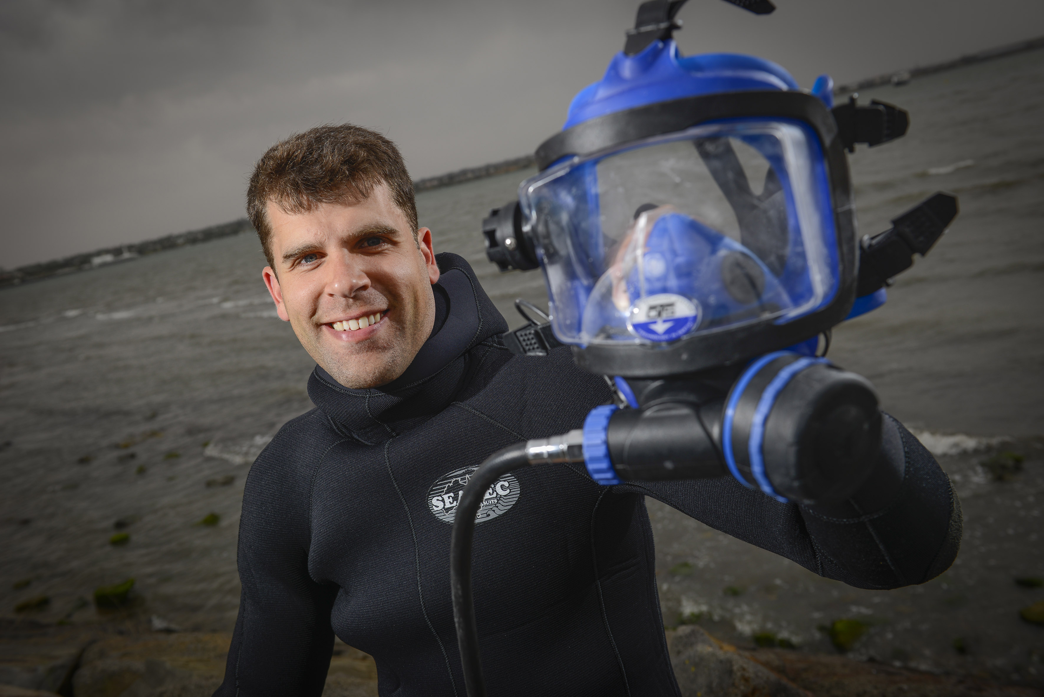 Headshot of Chris Gillies holding a scuba mask