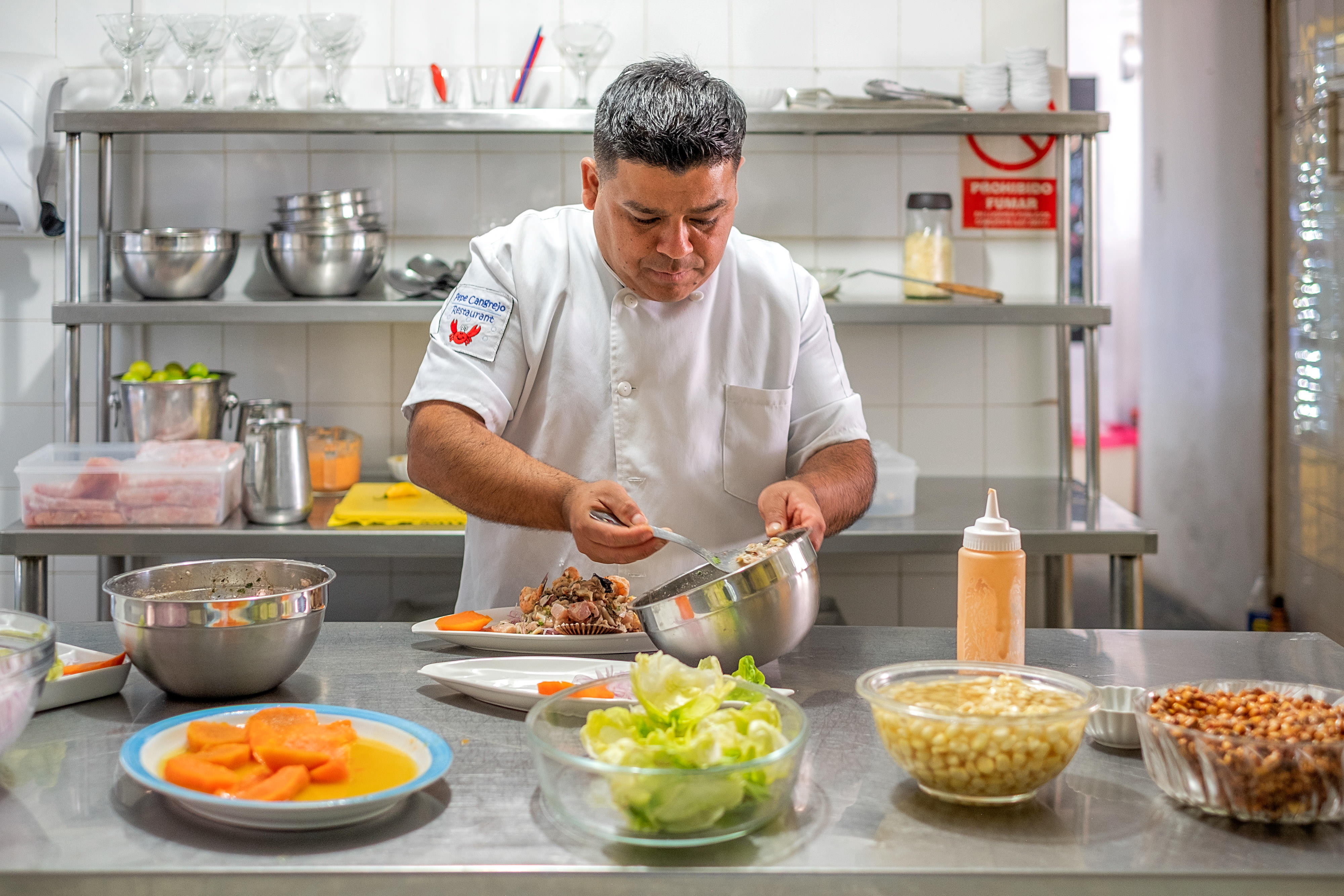 Chef Jose Fernandez owner of Pepe Cangrejo’s restaurant, prepares ceviche.
