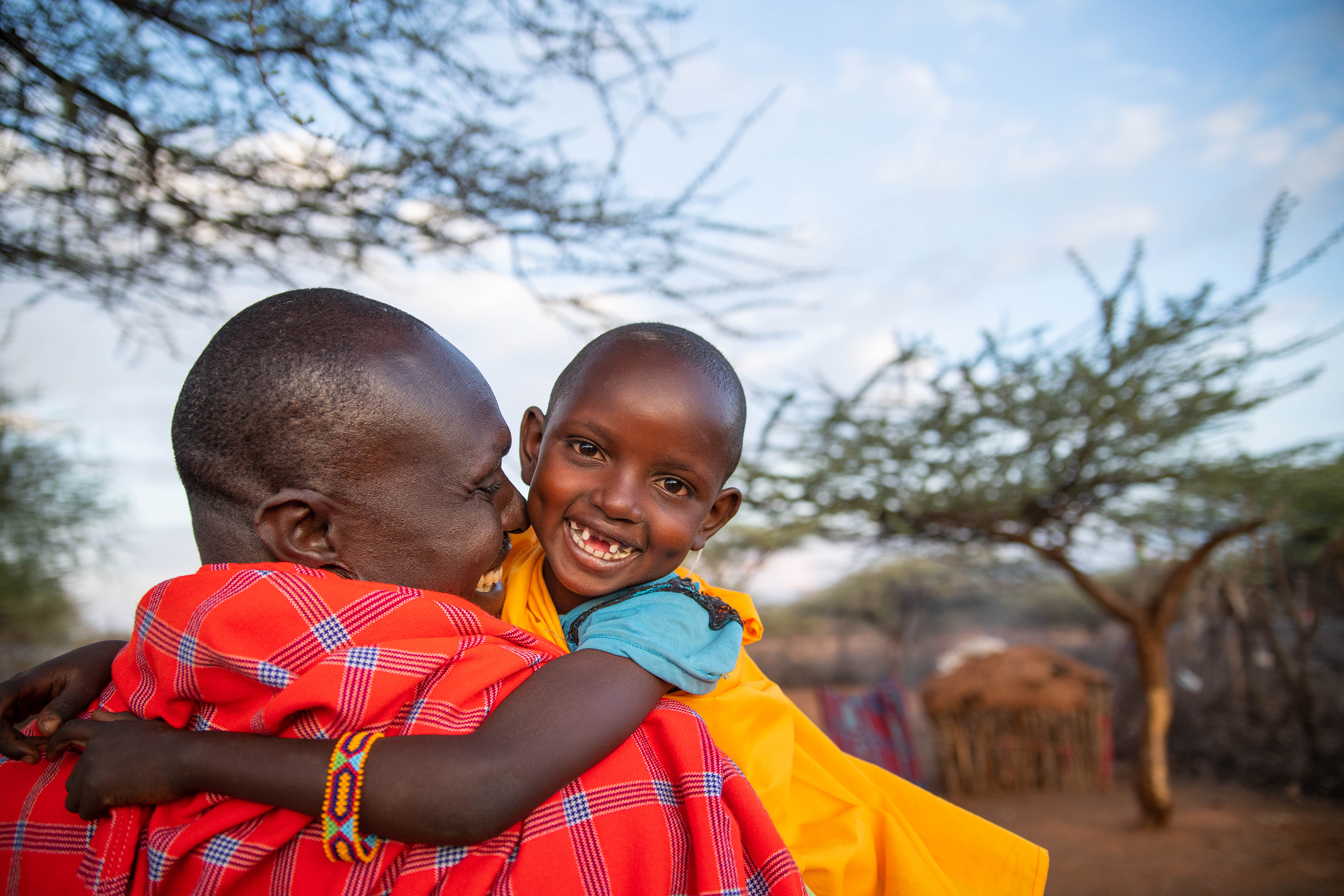 A ranger walking with his daughter