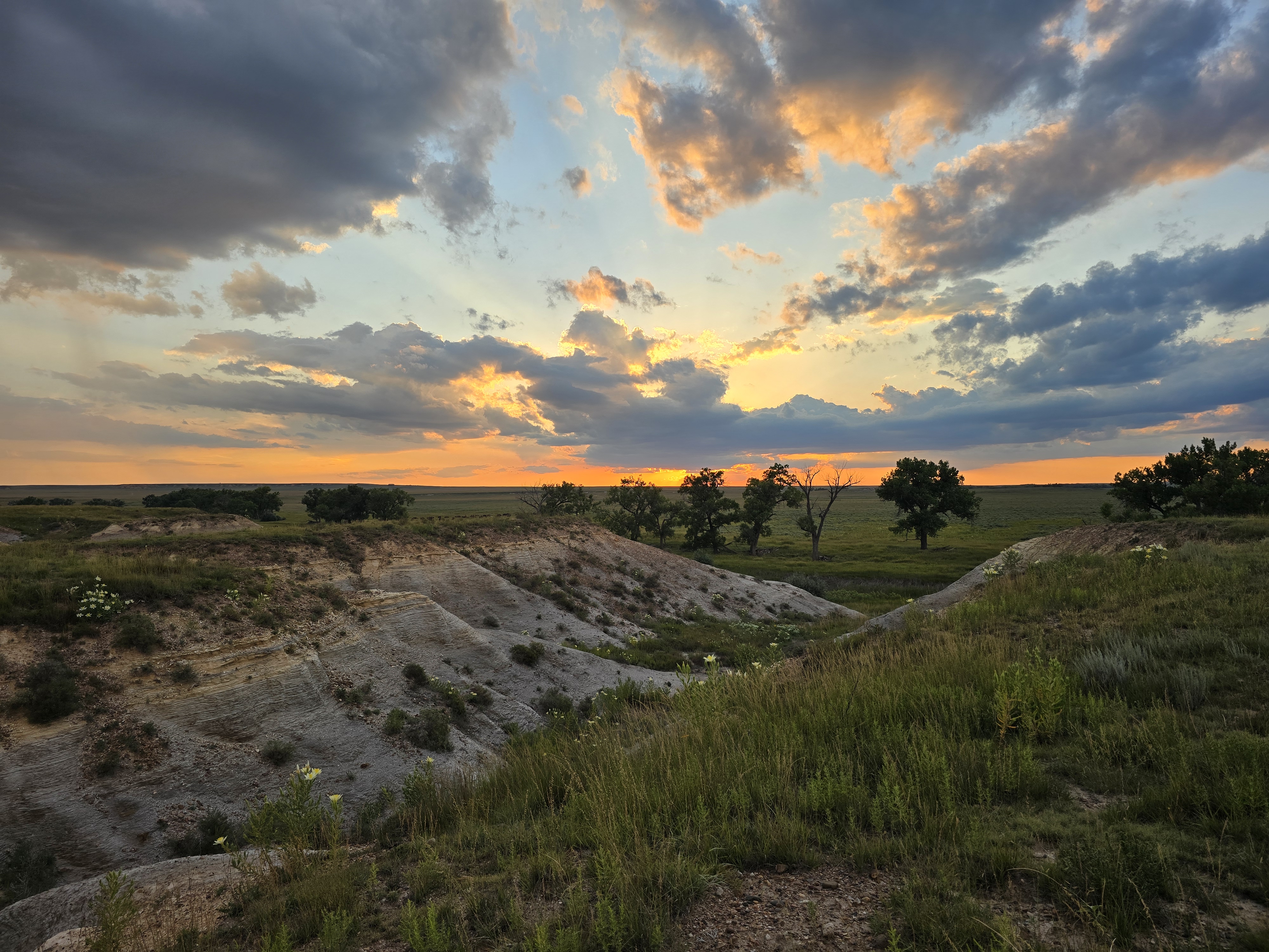 The sun sets over chalk bluffs at Smoky Valley Ranch.