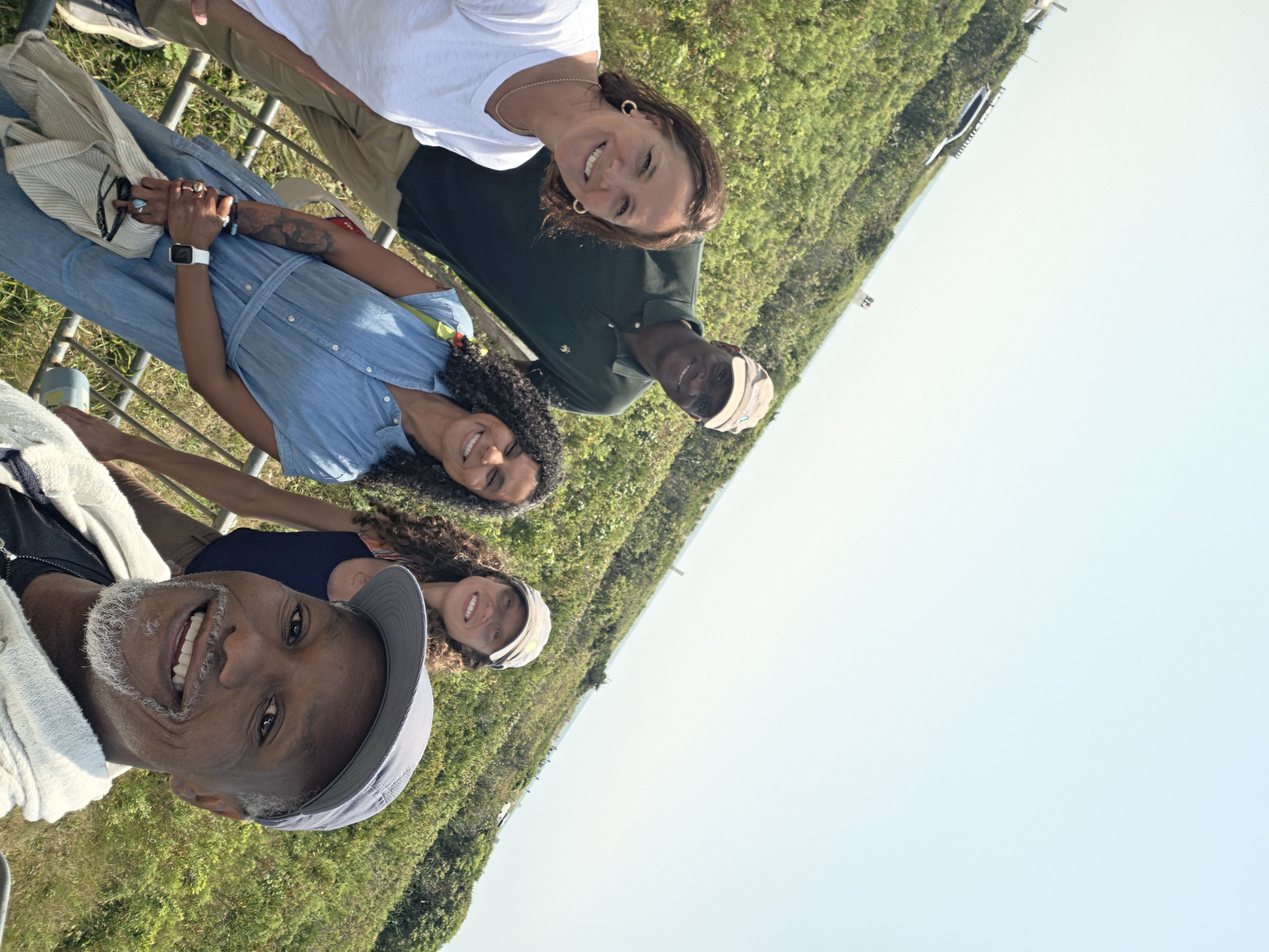 Selfie of five people on Martha's Vineyard with a meadow in the background.