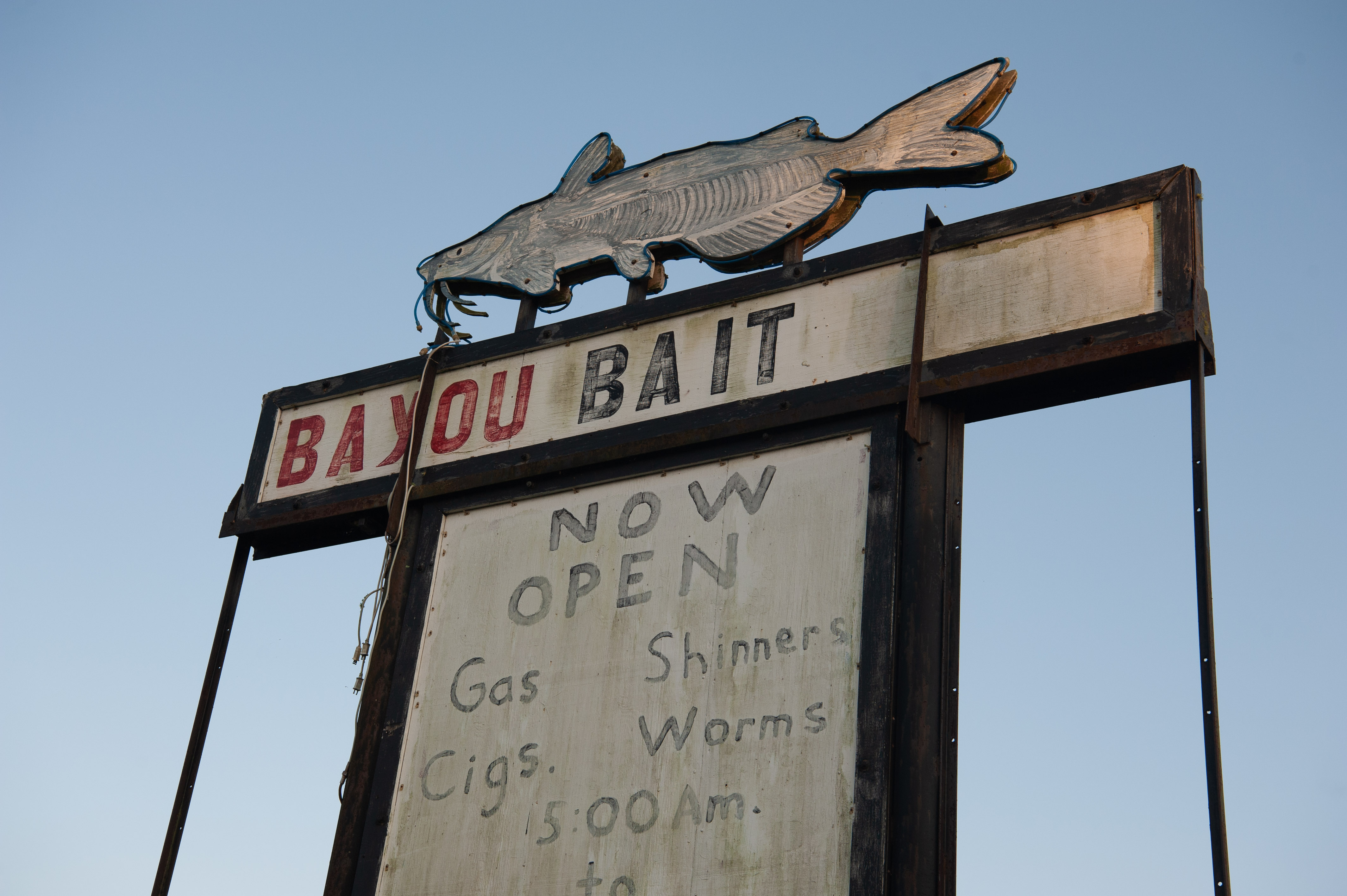 A faded sign for the Bayou Bait shop. 