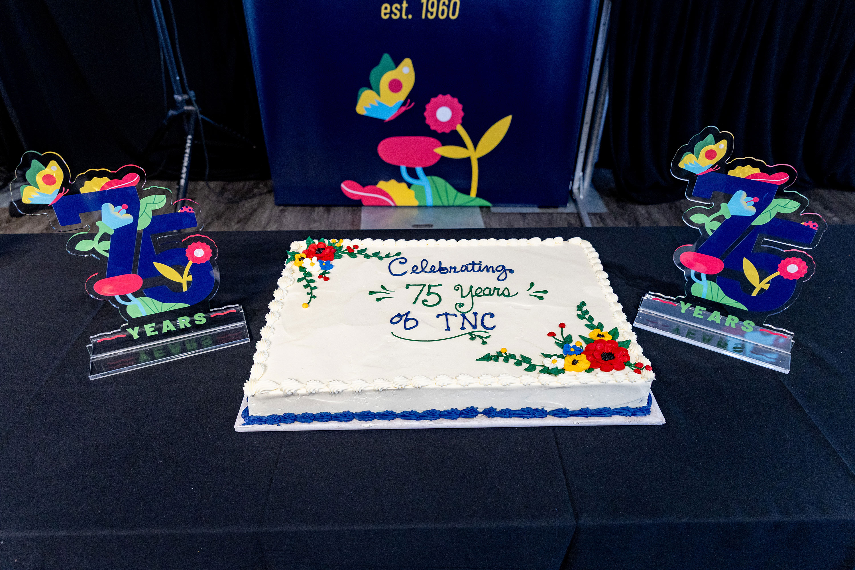 A sheet cake marks a 75th anniversary for The Nature Conservancy.