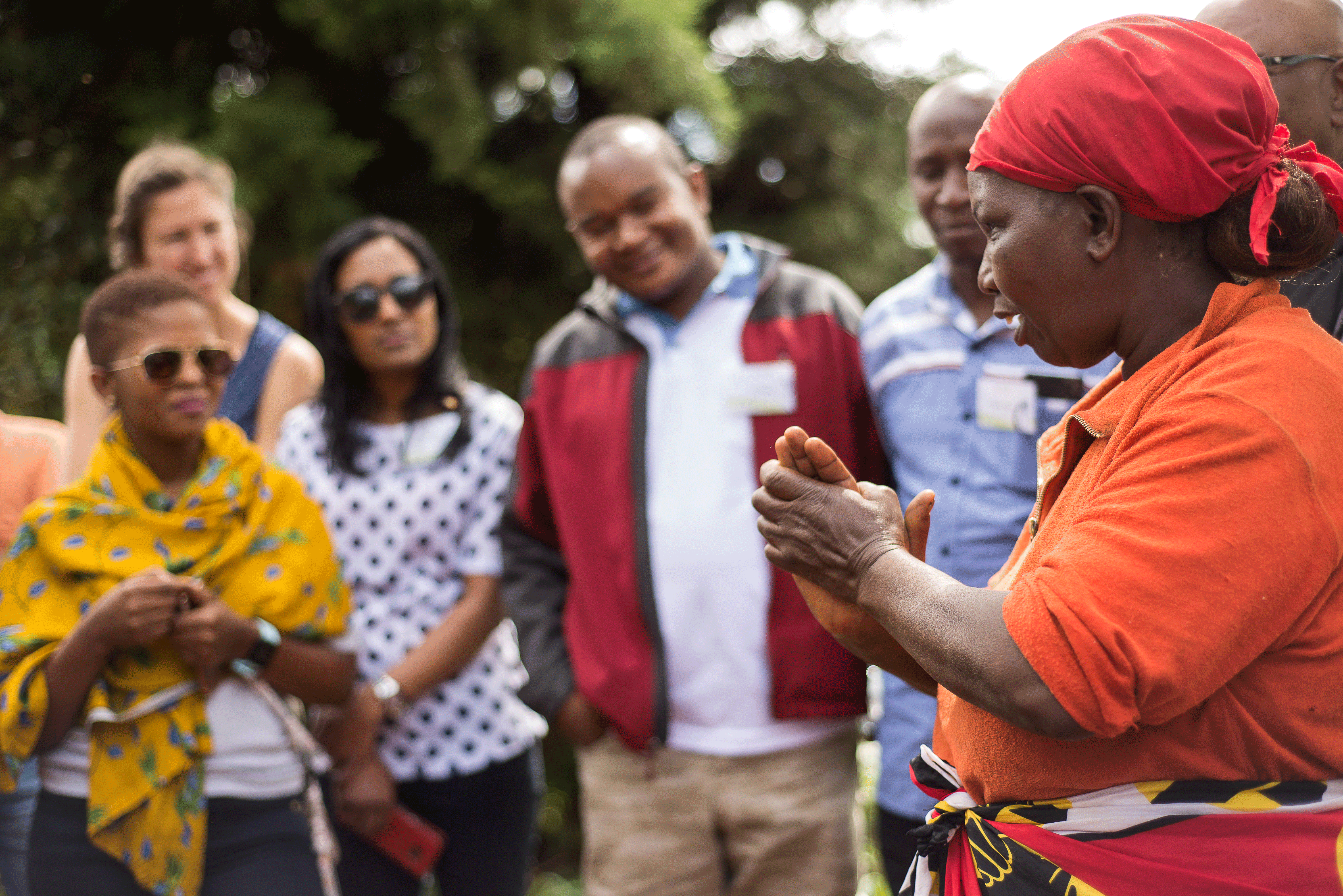Josephine Mwangi, a coffee farmer in the Nairobi watershed, tells visitors from the Africa Water Fund network about her efforts to achieve Rainforest Alliance Certification.
