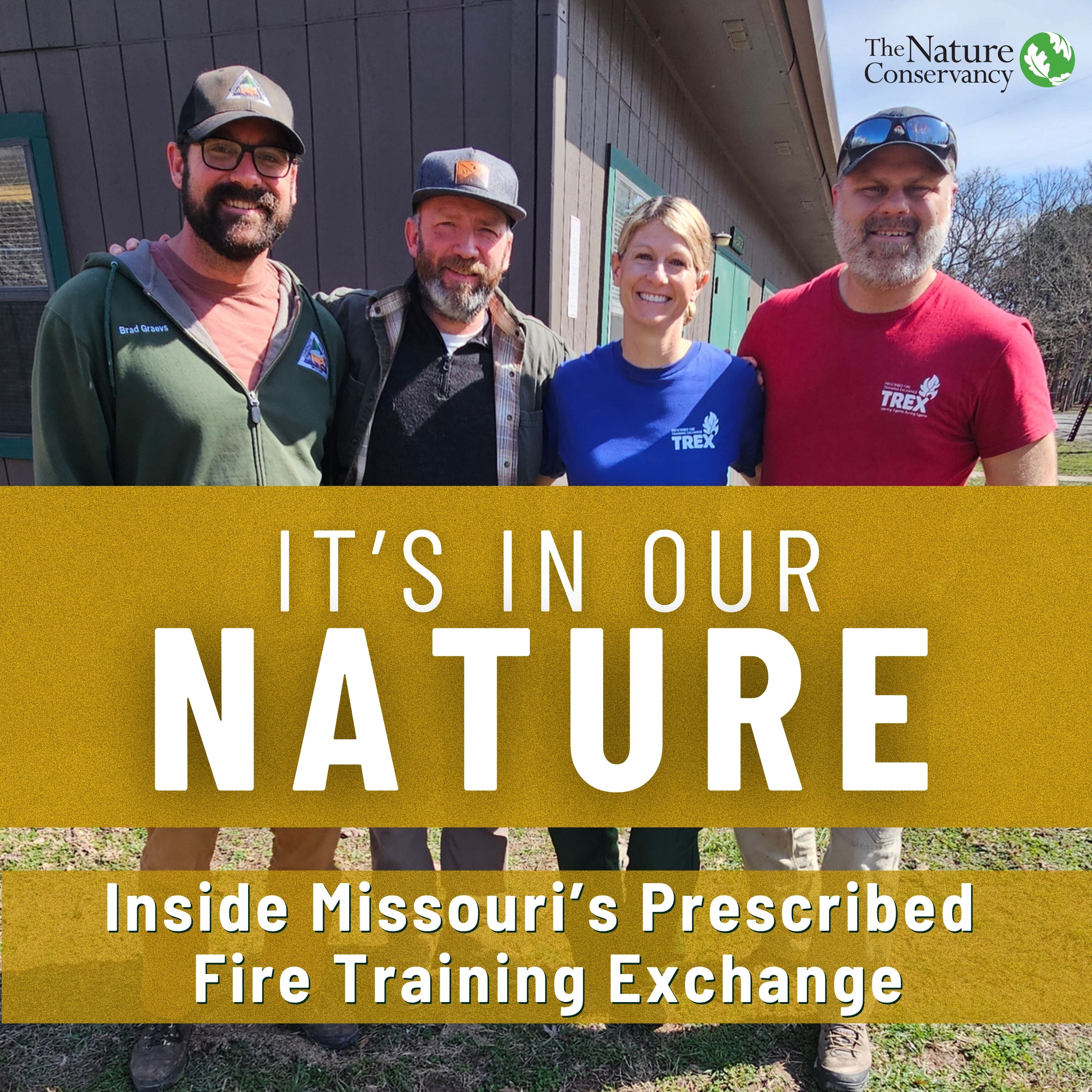 Four people posing for camera.