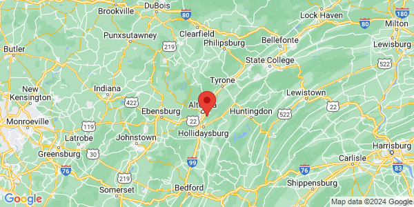 Map with marker: Combined road and topographic map showing an orange flag centered just slightly east of Altoona, PA.
